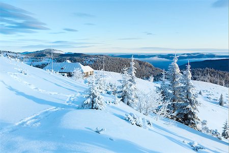 footprint winter landscape mountain - Morning winter mountain landscape with house on ridge and footsteps Stock Photo - Budget Royalty-Free & Subscription, Code: 400-07101006