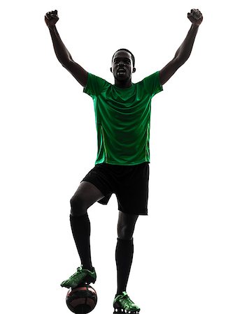 one african man soccer player celebrating victory green jersey in silhouette  on white background Stock Photo - Budget Royalty-Free & Subscription, Code: 400-07101439