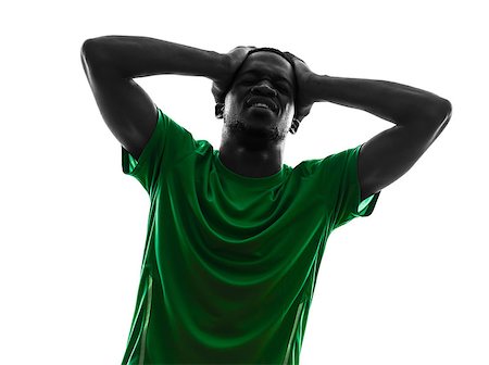 simsearch:400-07103133,k - one african man soccer player green jersey despair loosing in silhouette  on white background Stock Photo - Budget Royalty-Free & Subscription, Code: 400-07101441