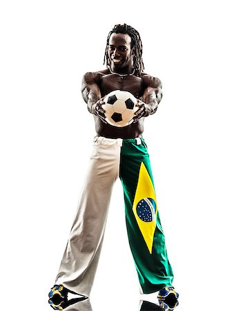 one brazilian black man soccer player holding showing football  on white background Stock Photo - Budget Royalty-Free & Subscription, Code: 400-07101466