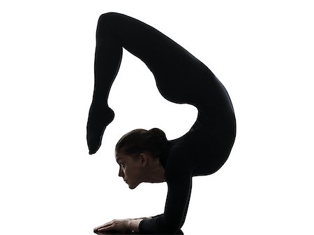 simsearch:400-07218974,k - one caucasian woman contortionist practicing gymnastic yoga  in silhouette   on white background Stock Photo - Budget Royalty-Free & Subscription, Code: 400-07101487