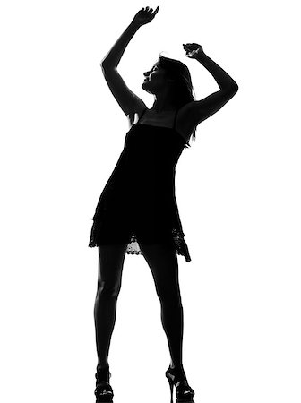 silhouette of dancers at party - stylish silhouette caucasian beautiful woman dancing  full length on studio isolated white background Photographie de stock - Aubaine LD & Abonnement, Code: 400-07101625
