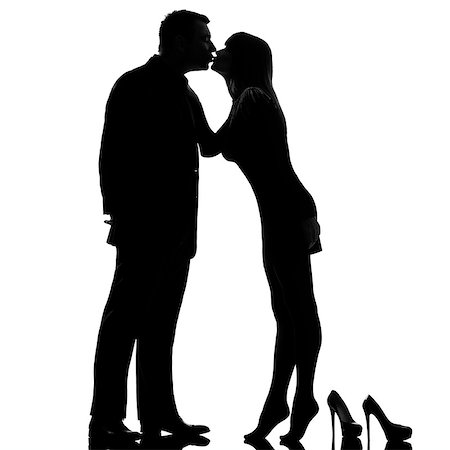 simsearch:400-07097695,k - one caucasian couple kissing man and woman barefoot tiptoe full length in studio silhouette isolated on white background Stock Photo - Budget Royalty-Free & Subscription, Code: 400-07103048