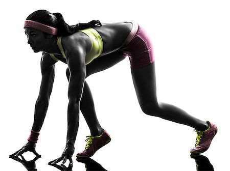 simsearch:400-06768313,k - one caucasian woman runner running  on starting blocks  in silhouette on white background Photographie de stock - Aubaine LD & Abonnement, Code: 400-07103116