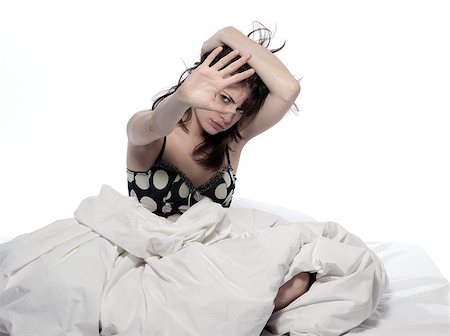 simsearch:695-05774214,k - one young woman in bed awakening tired insomnia hangover  in a white sheet bed on white background Stock Photo - Budget Royalty-Free & Subscription, Code: 400-07103206