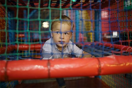simsearch:400-06737087,k - 3 year old boy having fun on the playground inside trade center Fotografie stock - Microstock e Abbonamento, Codice: 400-07103465