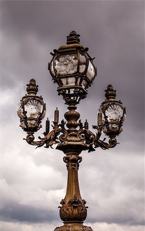 simsearch:400-06063916,k - Street Lantern on the Alexandre III Bridge against Cloudy Sky, Paris, France. Stockbilder - Microstock & Abonnement, Bildnummer: 400-07115015