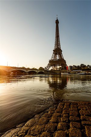 eifel - Eiffel Tower and Cobbled Embankment of Seine River at Sunrise, Paris, France Fotografie stock - Microstock e Abbonamento, Codice: 400-07115031