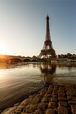 Eiffel Tower and Cobbled Embankment of Seine River at Sunrise, Paris, France Photographie de stock - Aubaine LD & Abonnement, Code: 400-07115031
