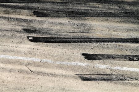 road line marking - Background with tire marks on road track Stock Photo - Budget Royalty-Free & Subscription, Code: 400-07115176