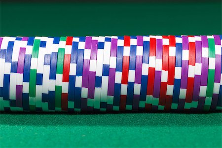 Colorful poker chips closeup on green cloth Stock Photo - Budget Royalty-Free & Subscription, Code: 400-07115368