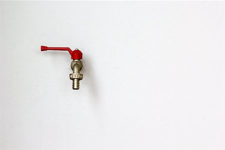pipes on wall - Closeup faucet on concrete white wall background Stock Photo - Budget Royalty-Free & Subscription, Code: 400-07115789