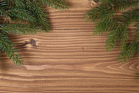pine abstract - green spruce twig on wooden plank, seasonal background Stock Photo - Budget Royalty-Free & Subscription, Code: 400-07116660