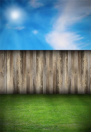 beautiful natural backdrop with wooden fence and green turf Photographie de stock - Aubaine LD & Abonnement, Code: 400-07116820