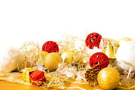 red ribbon and plant - christmas decoration over lights background Stock Photo - Budget Royalty-Free & Subscription, Code: 400-07111393