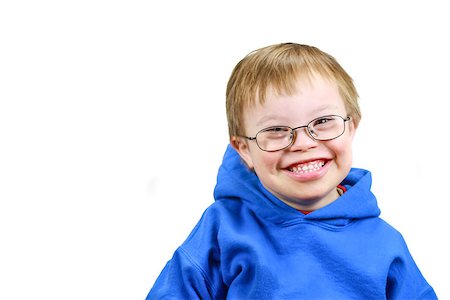Little boy with Downs Syndrome and very happy smile Stock Photo - Budget Royalty-Free & Subscription, Code: 400-07111508