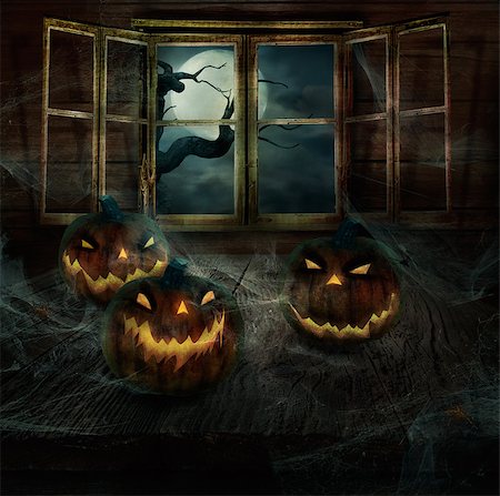 Halloween Design - Abandoned pumpkins.Holiday horror background with  Pumpkins, spider webs, and full moon with spooky tree Stock Photo - Budget Royalty-Free & Subscription, Code: 400-07111721