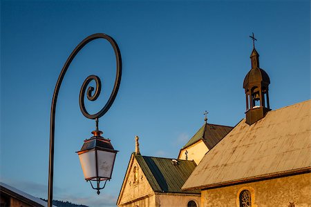 simsearch:400-08037885,k - Street Lamp and Medieval Church in Megeve, French Alps Stockbilder - Microstock & Abonnement, Bildnummer: 400-07111935