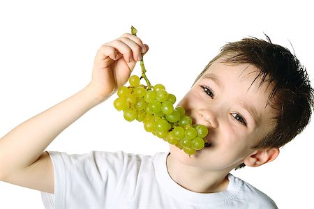 simsearch:400-06177351,k - Healthy eating concept with child eating grapes isolated on white Stock Photo - Budget Royalty-Free & Subscription, Code: 400-07112028