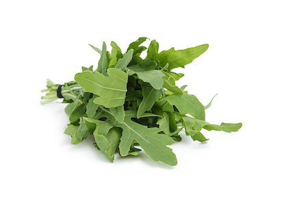 simsearch:400-04864980,k - tied bunch of fresh arugula, isolated on white Photographie de stock - Aubaine LD & Abonnement, Code: 400-07112355