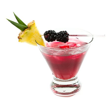 simsearch:400-06797125,k - cocktail served in a stemless martini glass garnished with a pineapple slice and blackberries isolated on a white background Stock Photo - Budget Royalty-Free & Subscription, Code: 400-07112364