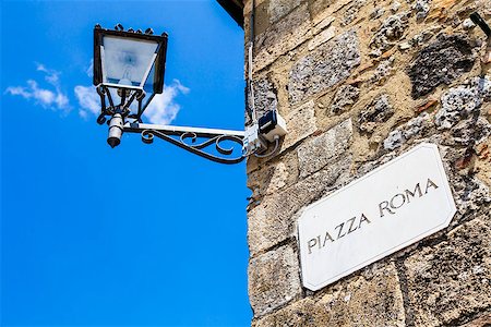 simsearch:400-07212378,k - Monteriggioni, Tuscany, Italy. Street plate of the main square of the town. Foto de stock - Royalty-Free Super Valor e Assinatura, Número: 400-07112605