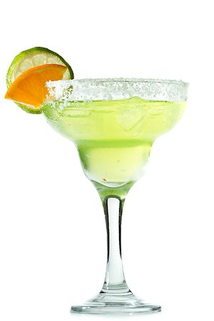 classic margarita with a salt rim, lime and orange garnish isolated on a white background Photographie de stock - Aubaine LD & Abonnement, Code: 400-07113280