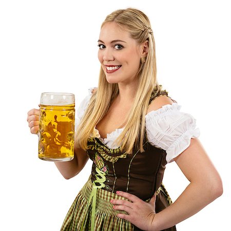 simsearch:400-07124078,k - Photo of a beautiful female waitress wearing traditional dirndl and holding a huge beer over white background. Stockbilder - Microstock & Abonnement, Bildnummer: 400-07124078