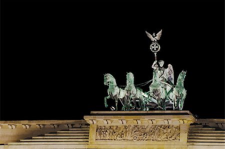 Tha statue upon the Brandenburg Gate in Berlin. It depicts Victoria and was created together with the gate between 1788 and 1791. Stock Photo - Budget Royalty-Free & Subscription, Code: 400-07124397