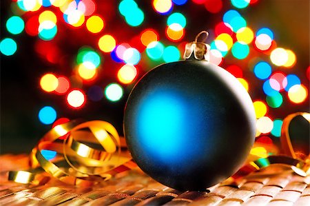 simsearch:400-07123692,k - Blue Christmas ball on the background of blurred lights garlands. Stock Photo - Budget Royalty-Free & Subscription, Code: 400-07124454