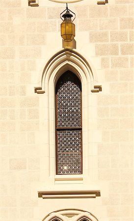 Ancient stained-glass window on stone wall Stock Photo - Budget Royalty-Free & Subscription, Code: 400-07124545