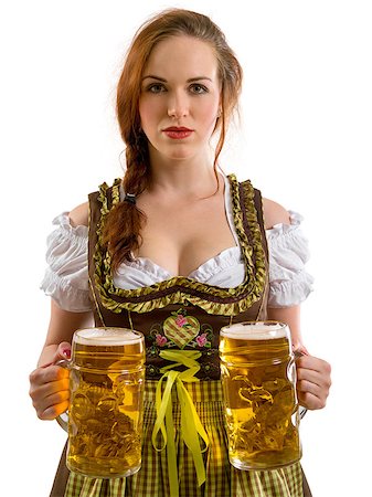 simsearch:400-07294051,k - Photo of a beautiful female waitress wearing traditional dirndl and holding huge beers over white background. Stock Photo - Budget Royalty-Free & Subscription, Code: 400-07124768