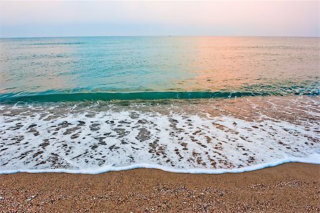 Splash of sea foam on a sandy beach Stock Photo - Budget Royalty-Free & Subscription, Code: 400-07125031