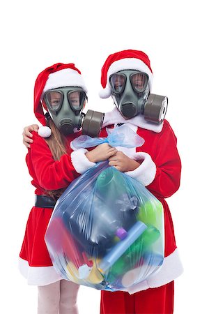 Santa and helper wearing gas masks holding bag of used plastic bottles waste - isolated Stock Photo - Budget Royalty-Free & Subscription, Code: 400-07125644