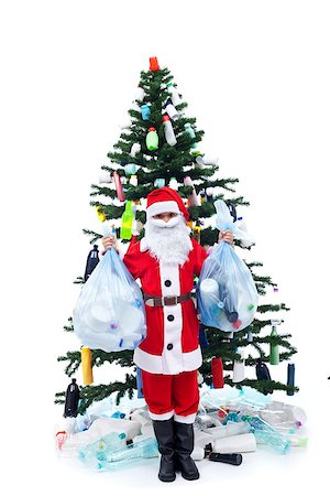 simsearch:400-07053928,k - Wasted christmas - environment concept with santa and plastic bottles decorated tree Photographie de stock - Aubaine LD & Abonnement, Code: 400-07125642
