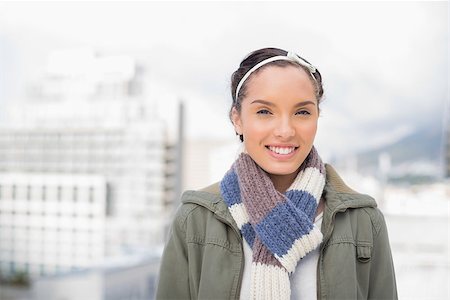 Attractive woman outside smiling at camera Stock Photo - Budget Royalty-Free & Subscription, Code: 400-07126661