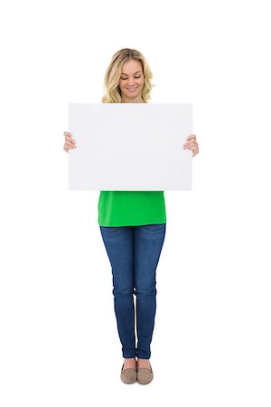 Smiling cute blonde holding white poster on white background Stock Photo - Budget Royalty-Free & Subscription, Code: 400-07126869