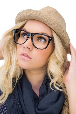 simsearch:400-06956665,k - Thoughtful trendy blonde with classy glasses posing on white background Stockbilder - Microstock & Abonnement, Bildnummer: 400-07126937