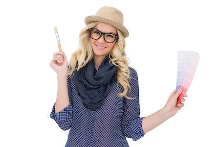 simsearch:400-06956665,k - Cheerful trendy blonde with classy glasses holding color chart on white background Stockbilder - Microstock & Abonnement, Bildnummer: 400-07126942