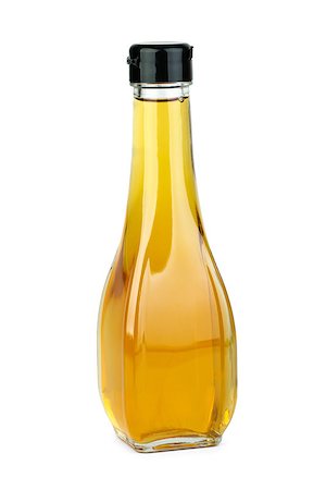 Glass bottle with apple vinegar  isolated on the white background Stock Photo - Budget Royalty-Free & Subscription, Code: 400-07123011