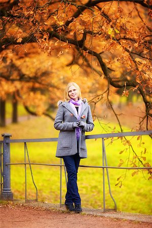 simsearch:400-07042487,k - beautiful smiling blond girl in autumn park Stock Photo - Budget Royalty-Free & Subscription, Code: 400-07123161