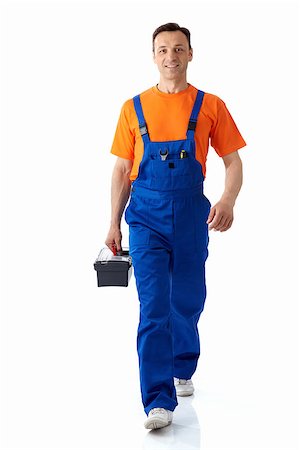 simsearch:400-07165423,k - Plumber in uniform on a white background Foto de stock - Royalty-Free Super Valor e Assinatura, Número: 400-07123304