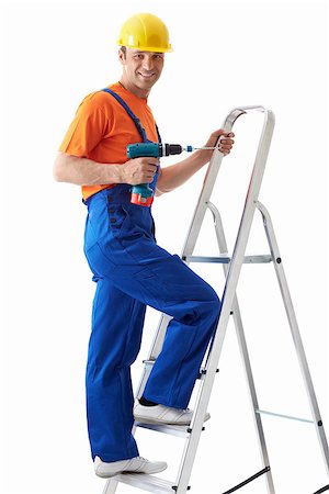 simsearch:400-07165423,k - Builder with drill on stepladder Foto de stock - Royalty-Free Super Valor e Assinatura, Número: 400-07123326