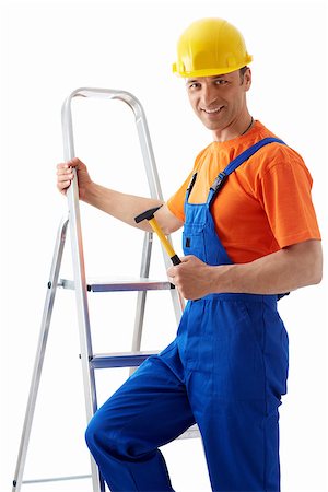 simsearch:400-07165423,k - Builder on a ladder with hammer Foto de stock - Royalty-Free Super Valor e Assinatura, Número: 400-07123327