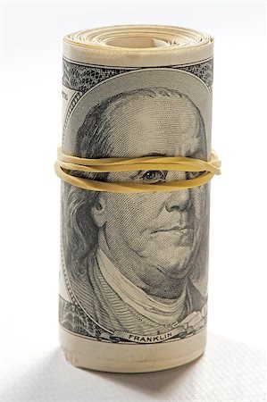 Portrait of Benjamin Franklin beholder bills through clerical gum Stock Photo - Budget Royalty-Free & Subscription, Code: 400-07123683