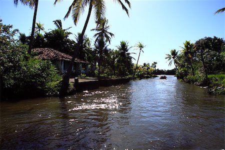 dugout boat - little house in front of the sea in Sao Luis Of Maranhao in  brazil Stock Photo - Budget Royalty-Free & Subscription, Code: 400-07123836