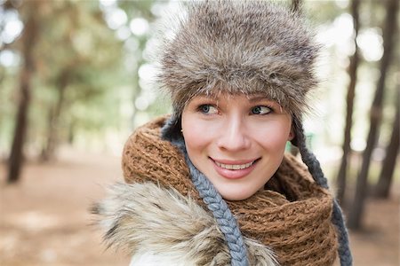 fur stole fashion - Close up of a beautiful woman in fur hat with woolen scarf in the woods Stock Photo - Budget Royalty-Free & Subscription, Code: 400-07135635