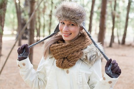 fur stole fashion - Portrait of a beautiful woman in fur hat with woolen scarf and jacket in the woods Stock Photo - Budget Royalty-Free & Subscription, Code: 400-07135639