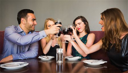 pic of friends in bar celebration - Happy friends drinking red wine in a bar and toasting each other Stock Photo - Budget Royalty-Free & Subscription, Code: 400-07137936