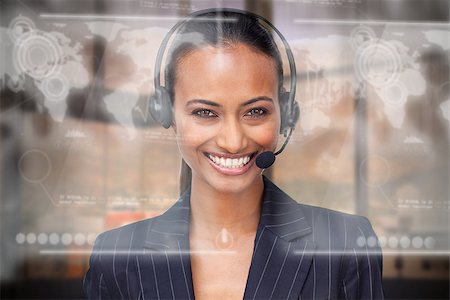 simsearch:400-07138128,k - Attractive smiling businesswoman using futuristic interface hologram looking at camera Stock Photo - Budget Royalty-Free & Subscription, Code: 400-07138091